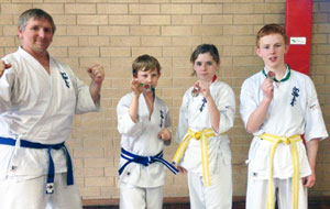 Jack, Briana & Liam at Albury tournament, with coach Matt